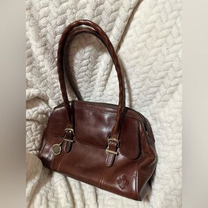 Patricia Nash leather handbag in brown with textured straps, almost twist style